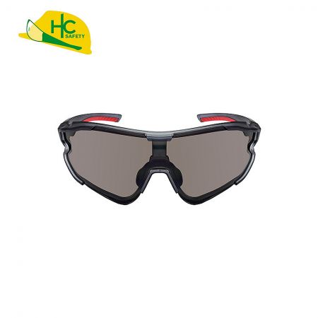This is a pair of sports safety glasses with full coverage design and dark lenses to provide eye protection. There are red anti-slip pads on the frames of the glasses, which adds to the visual appeal.