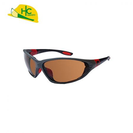 Safety glasses with non-slip brown lenses on the frame and nose bridge.