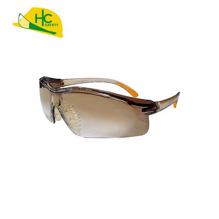 Safety glasses with shatterproof, impact-resistant brown lens temples.