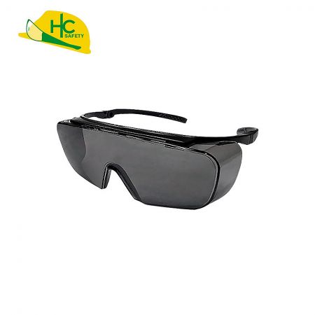 Smoke lens safety glasses that provide full field of view and side protection.