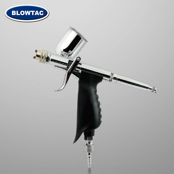 Aerógrafo de alimentação lateral por gravidade de ação dupla