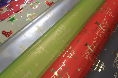 Metallic gift wrapping paper with design printed for Christmas holidays