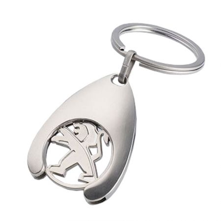 Nuestros llaveros de monedas de carrito en forma existente pueden llevar tu logotipo.