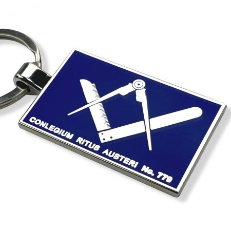 The masonic keychain is filled with various colored enamel paints.