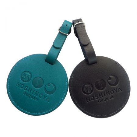 Personalized round luggage tags are good souvenirs for travel agencies.