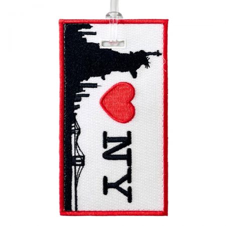 Opgrader dit rejseudstyr med broderede skræddersyede kufferttasker.