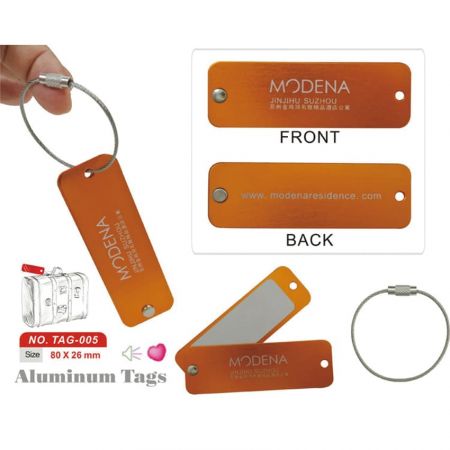 Os tags de bagagem de metal podem ser fixados em qualquer mala.