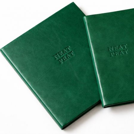 Lærmenyomslag - Tilpasset lærmenyomslag.