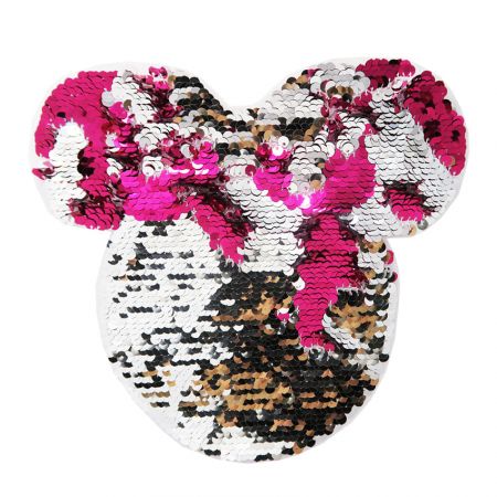 The reversible sequin patch on the fabric come in two different colors.