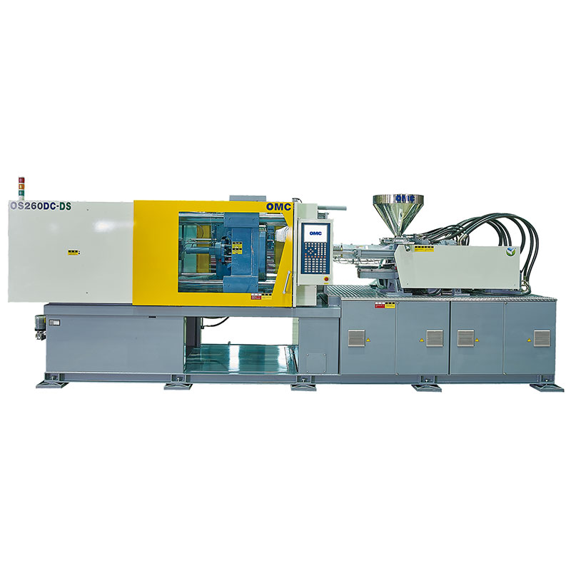 Dual color plastic injection molding machine with Toshiba servo motor.