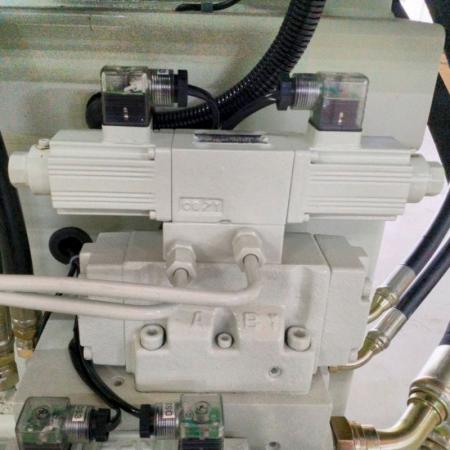 塑膠射出機使用油研比例電磁閥放大器