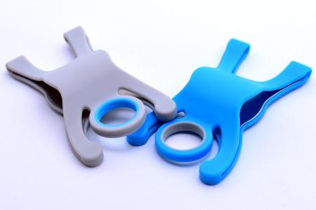 The phone holder is silicone combined with metal.