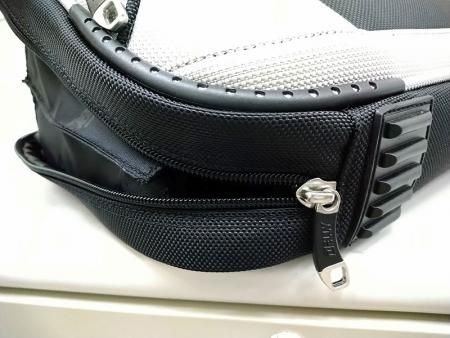 Main compartment's zipper can be unzipped all the way to the bottom to open the main compartment to the fullest.