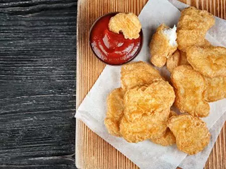 Dây chuyền sản xuất Nuggets gà. - Nuggets gà, Nuggets gà chiên, Đề xuất kế hoạch sản xuất và ứng dụng thiết bị của Nuggets gà đông lạnh.