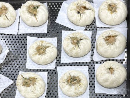 Un ratio de pâte à garniture de 1:1 a causé des fissures dans les Buns de Viande après la cuisson à la vapeur, affectant l'apparence et la qualité