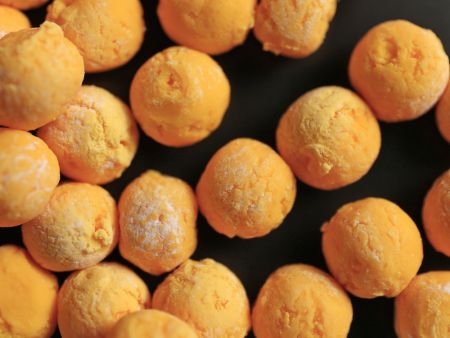 Después de los ajustes de ANKO, las bolas de camote quedan redondeadas y perfectamente formadas