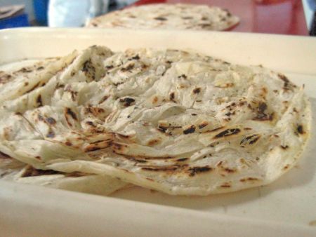 Dopo la cottura della Lachha Paratha, la consistenza risulta soffice e il sapore delizioso