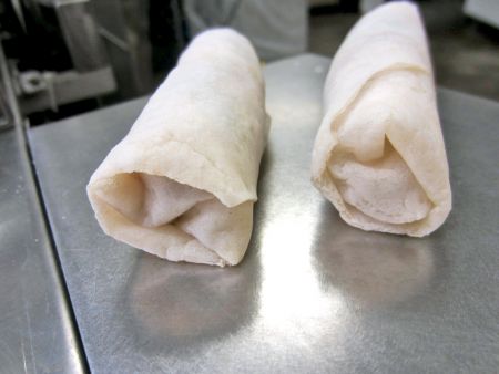 Ingredients are tucked in well and Spring Rolls are formed without protruding which meet client’s requirements
