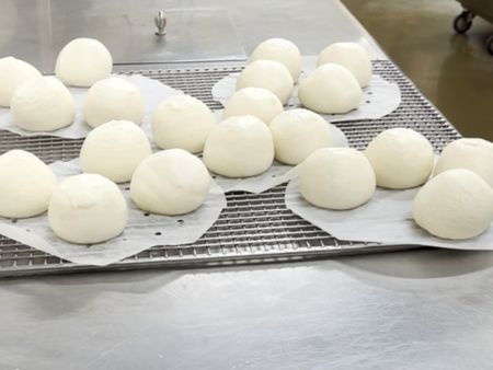 Perfectly formed and steamed custard buns