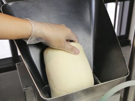Place premade dough into the dough hopper