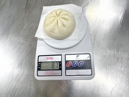 ซาลาเปาเนื้อที่นึ่งมีน้ำหนัก 87 กรัม เป็นผลจากการปรับอัตราส่วนแป้งต่อไส้ให้เหมาะสม