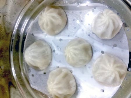 Steamed Soup Dumplings are infused with delicious meat juice
