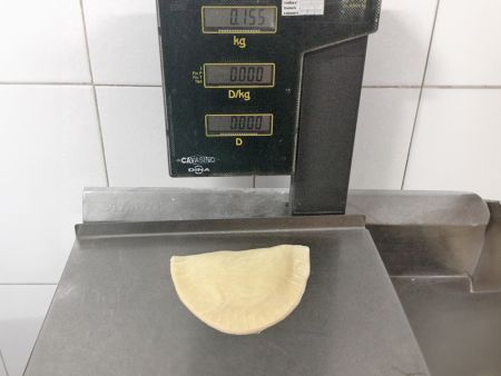 The Calzones weigh 155g (5.47oz) before baking