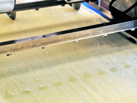 Como fazer lachha paratha em camadas usando uma máquina?