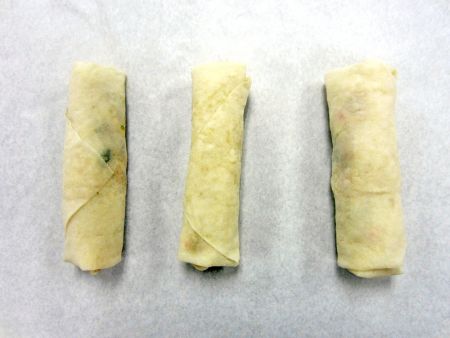 There are slight protruding on both ends of the Spring Rolls