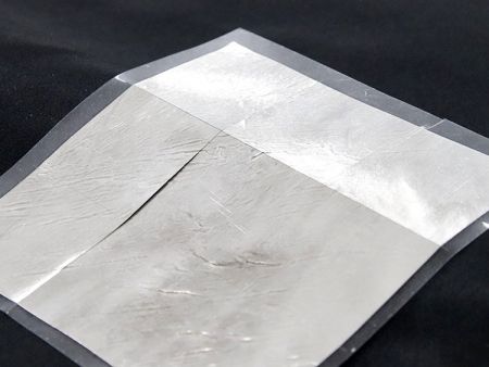 Laser-Mikroschneiden von wärmeleitender Indiumfolie in Prozessoren - Hortech verwendet einen Präzisionslaser, um das wärmeleitende Material - Indiumfolie - zu schneiden.