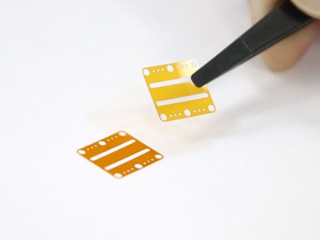 Micro-Drilled and Micro-cut, Shielded PI - Employ laser micro-drilling in a specific zone for subsequent back-end processing in the unshielded zone of the PI material
