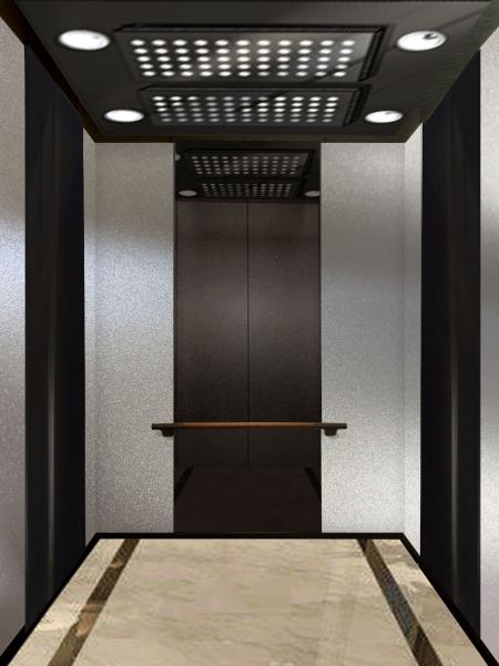 The front of an elevator with door opened and stylish decoration. The elevator car wall are decorated with Champagne Silver laminated metal plates.