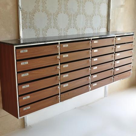 Side panoramic view of a high-end indoor mailbox decorated with Walnut grain PVC laminated metal plate