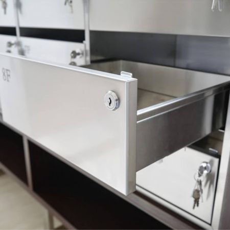 A close-up view of a high-quality cluster mailboxes in an open state, using Transparent Matte Finish Anti-fingerprint Stainless Steel plates to decorate the surface
