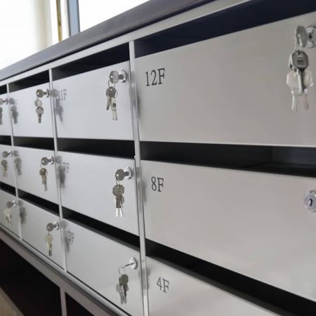 A high-quality cluster mailboxes in an open state, using Transparent Matte Finish Anti-fingerprint Stainless Steel plates to decorate the surface