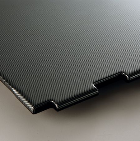 Laptop case decorated with dark plain laminated metal plate