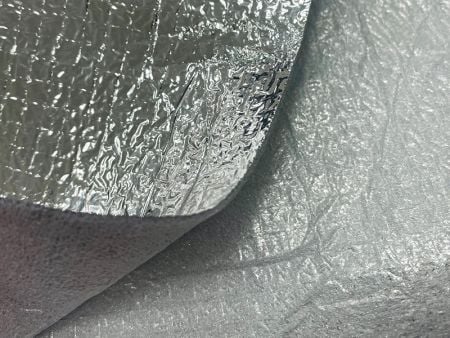 Lamination films for paper and cardboard applications - Heat insulation pad is made of aluminum foil attached.