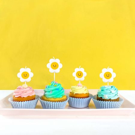 Vela em forma de margarida para cupcake