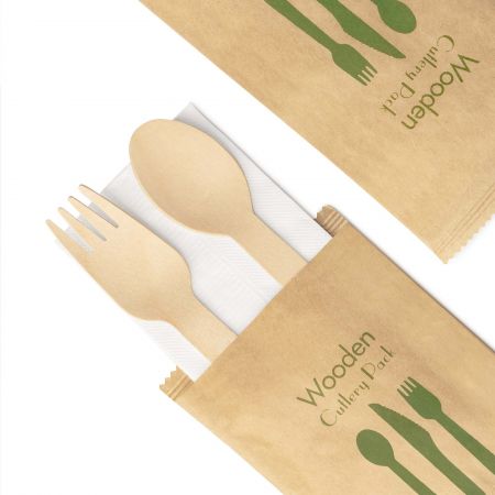 牛皮紙包木製匙叉餐具組 - 印刷牛皮紙袋包裝木製三合一匙叉餐包組包含16公分木製湯匙、16公分木製叉子還有一張13吋餐巾紙，一箱有500套。外袋上印有木餐具的注意事項。