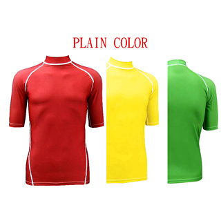 Rashguards mit kurzen Ärmeln in einfarbigen Farben – hier in Rot, Gelb und Grün als Beispiele; erhältlich in verschiedenen Farben und druckbaren Optionen.