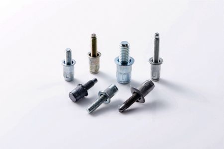 Blinda nitmuttrar - A Blind Rivet Stud consists of a blind rivet nut and a bolt, leaves a threaded stud, protruding from the workpiece, for components to be attached with a mating nut