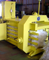 Горизонтальный пресс-подборщик, Вертикальный пресс-подборщик