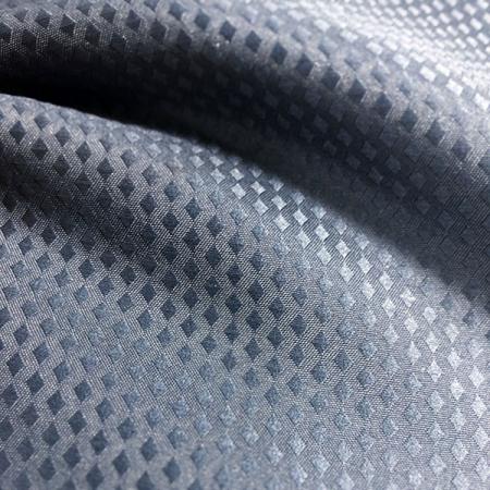 Tissu léger en polyester - Tissu avec des propriétés absorbantes et hydrofuges durables.