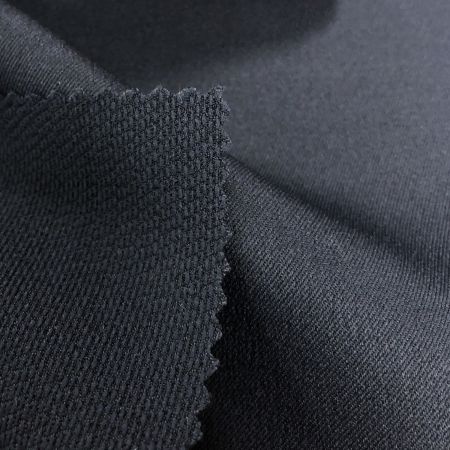 Tissu en polyester recyclé extensible mécaniquement - Tissu en polyester recyclé extensible mécaniquement