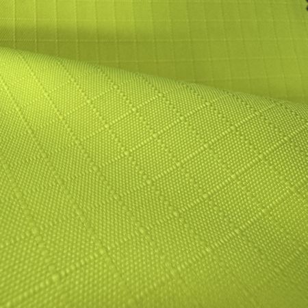 Tkanina CORDURA® z poliestru ripstop z powłoką PU EN471 w kolorze fluorescencyjnym żółtym - Tkanina CORDURA® z poliestru ripstop z powłoką PU EN471 w kolorze fluorescencyjnym żółtym