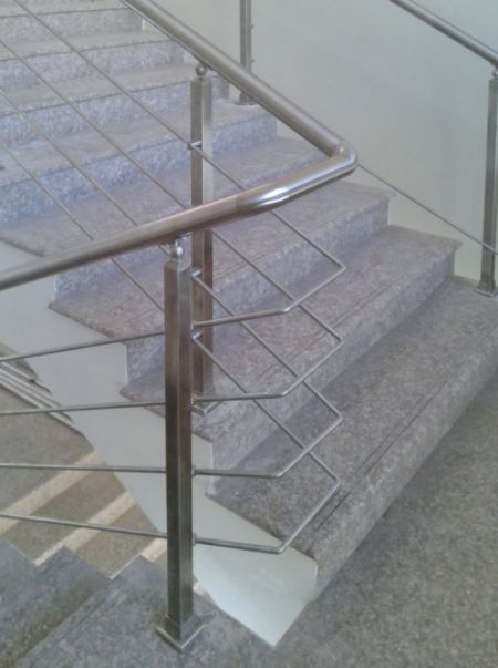 Stainless steel elbows at the 180-degree turn of the stainless steel staircase
