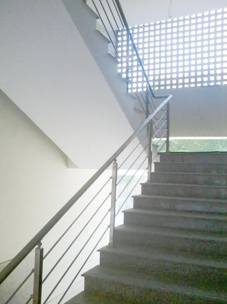 Stainless steel stair handrail upstairs view