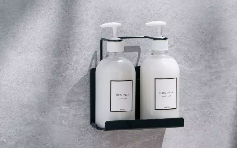 Support personnalisé pour s'adapter à la bouteille d'articles de toilette de la marque