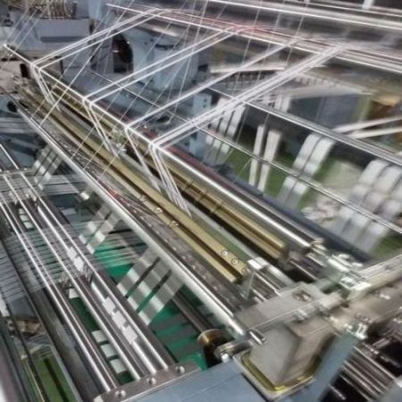 máquina-de-tricô-de-produção-total
