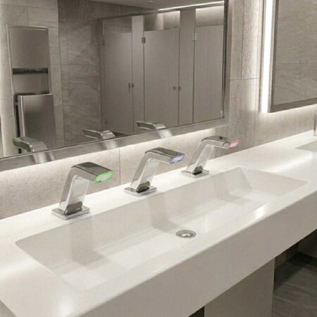 What are the main advantages of choosing deck-mounted soap dispensers over wall-mounted ones